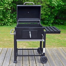 Load image into Gallery viewer, Black Rhino large bbq with lid open to show grilling and warming racks, 2 wheels, storage shelves and adjustable coal tray height, sitting on garden decking

