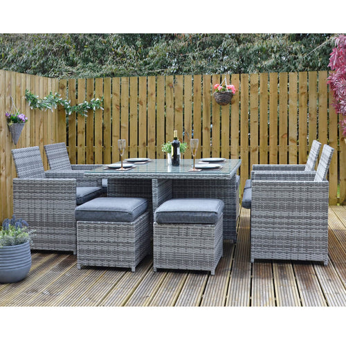 Monza 8 seater cube set, grey rattan garden furniture on decking with flowers and plants, for outdoor dining
