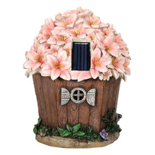 Load image into Gallery viewer, Back of the Blossom house solar ornament.
