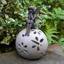 Load image into Gallery viewer, Sitting fairy garden solar light ornament in garden.
