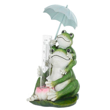 Load image into Gallery viewer, Novelty frog family rainfall guage with glass measuring tube, pink water lily and a blue umbrella
