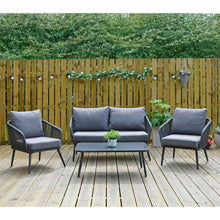 Load image into Gallery viewer, Black metal garden sofa set with string style arms, matching grey cushions and a black glass top coffee table, sitting outdoors on decking with plants and party lights

