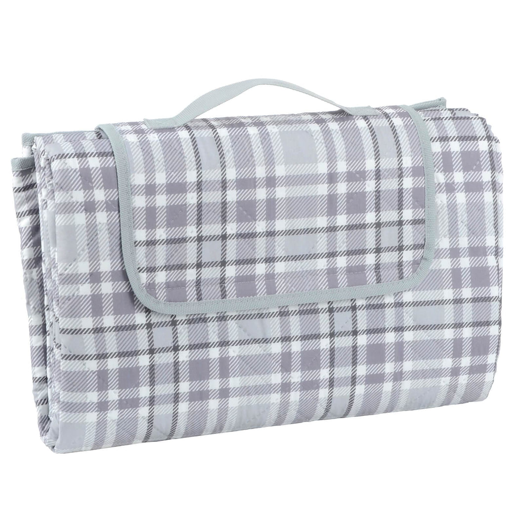 grey and white tartan picnic blanket with carry handle and velcro fastening to the front