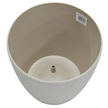 Load image into Gallery viewer, Beige sandstone effect plastic plant pot showing raised drainage hole in the base
