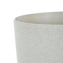 Load image into Gallery viewer, Close up of the Azuma beige stone effect round plant pot.
