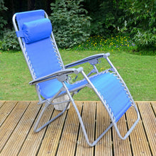 Load image into Gallery viewer, Garden chair, blue zero gravity recliner with grey frame, sitting on decking with shrubs and flowers

